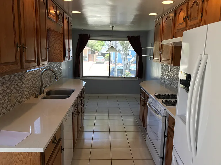 Closer view of kitchen.