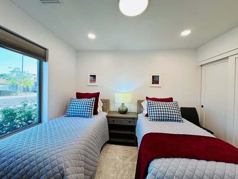 Guest Bedroom 3: 
Two Twin beds, ideal for kids, singles, or friends traveling together.