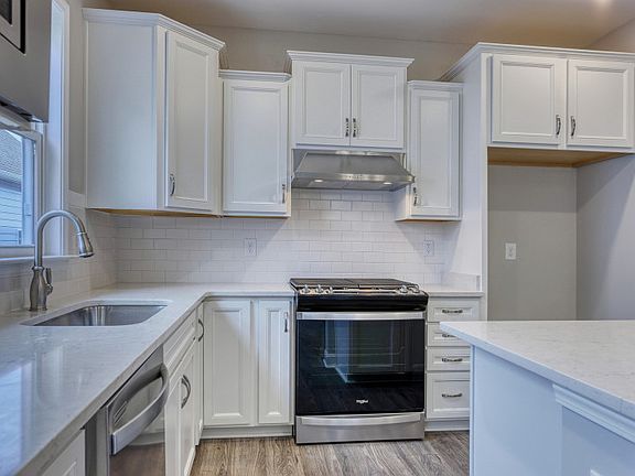 Prepare your favorite dish in the stunning kitchen with an included kitchen.