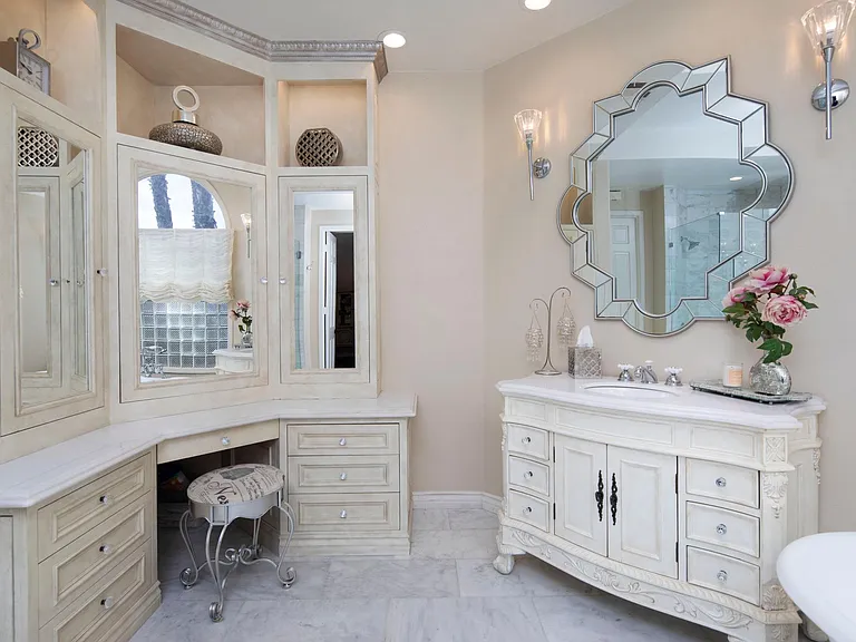 Primary bathroom features 2 sink areas
