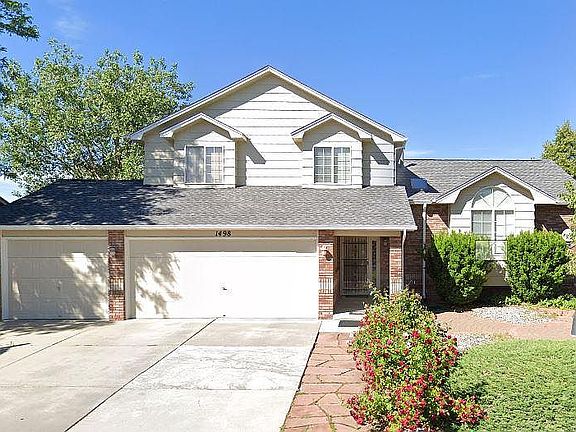 3 car garage. Low maintenance front yard with pavers and shrubs