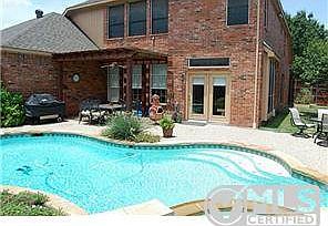 Awesome backyard oasis with pool, hot tub, & pergola!
