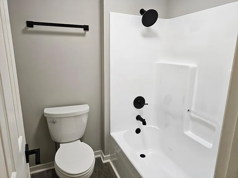 master bath with resurfaced shower/tub