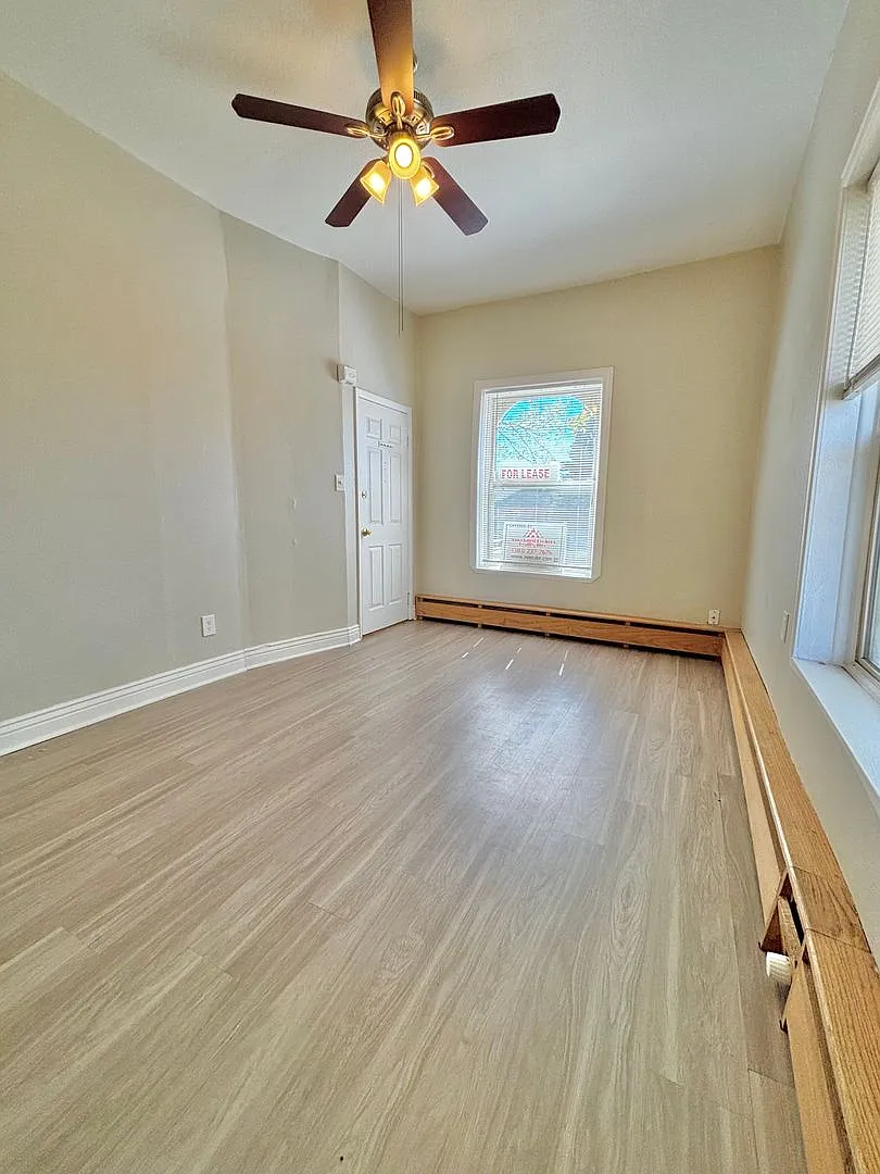 Building Photo - 3127 W 28th Ave #7