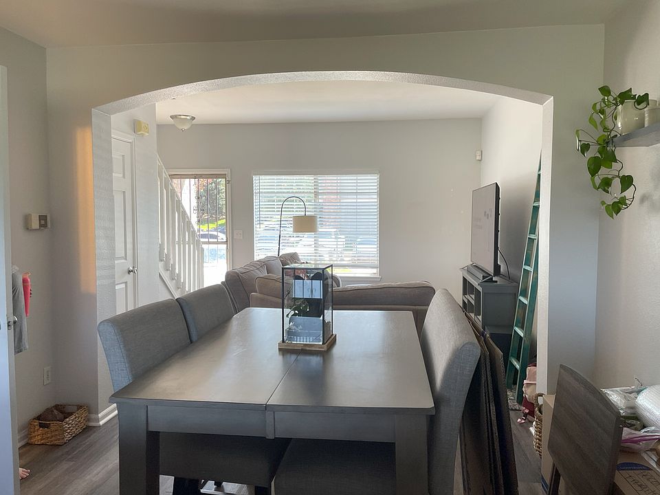 dining and living room, front door, stairs to upstairs