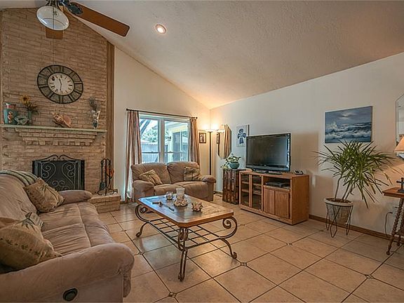 Comfortable living room with natural light from large windows!