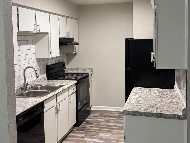 Functional 1BR/1BA galley kitchen layout with ample storage makes it easy to prepare meals for family & friends.