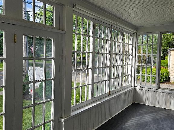 Front porch. All the windows open and lock to let the summer breeze flow through.