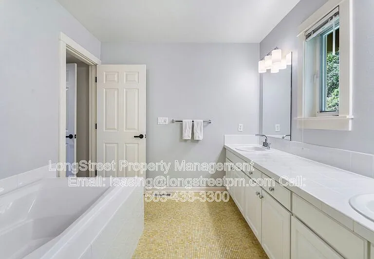 10247 NW Village Heights Dr — Photo 38