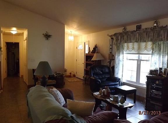 LIVING ROOM AND FOYER