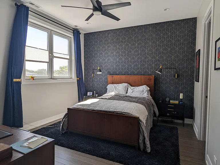 Primary bedroom with queen bed