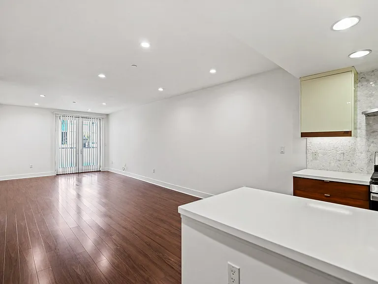 Open-Concept Kitchen, Dining, and Living Room Areas