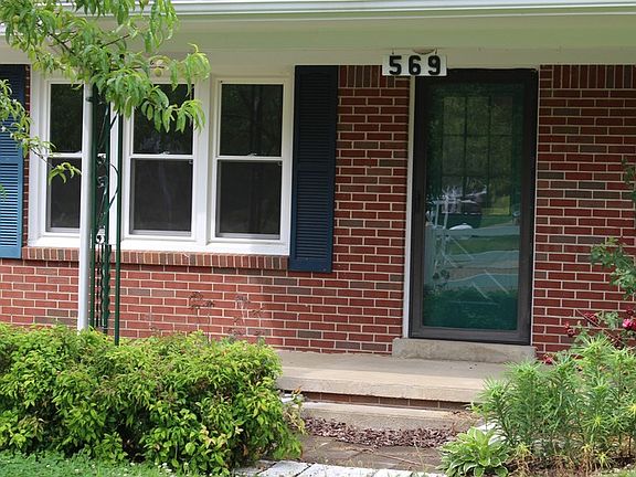 Close View of Front Porch and Door : Two chairs will comfortably fit on the porch.
