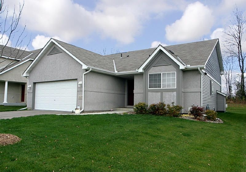 Delightful Curb Appeal with Stucco Front 