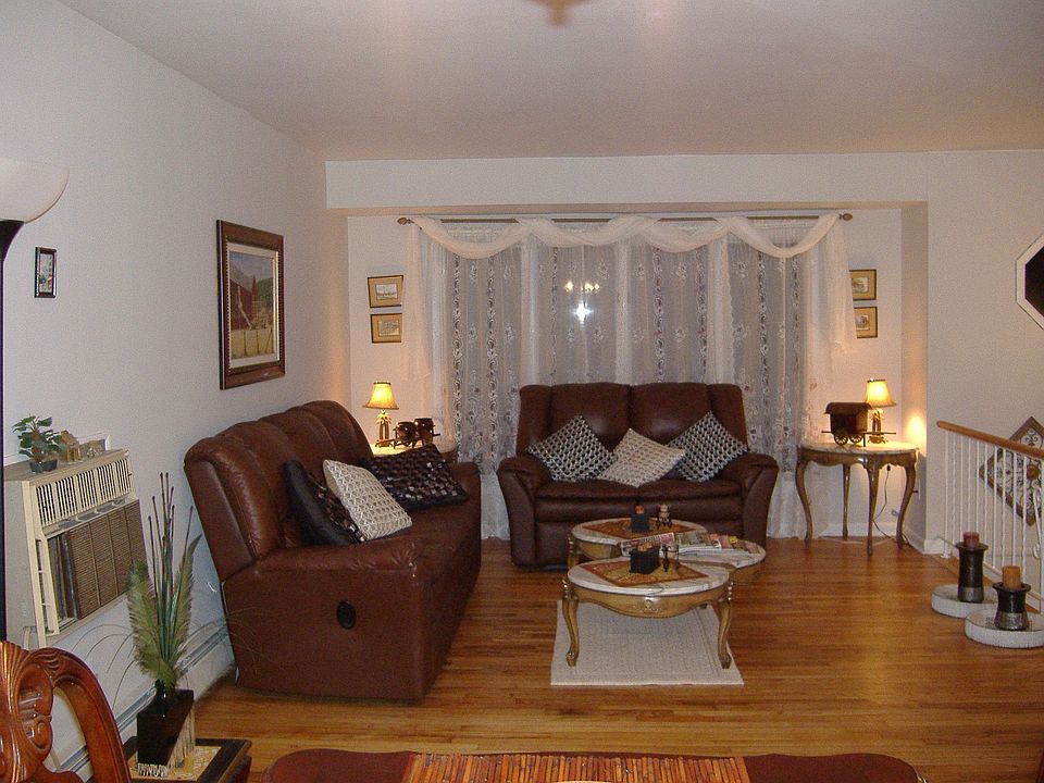 Big living room with refinished hardwood floor