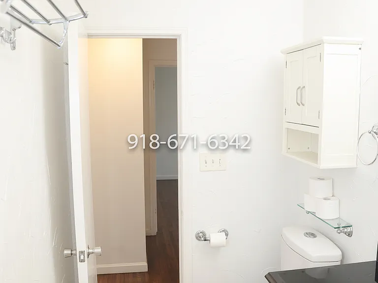 Bathroom, looking to the hallway.
