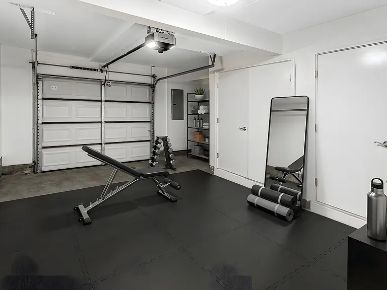 One-car garage with separate storage and utility rooms provides plenty of space for parking, tools, and seasonal items.