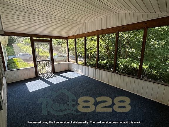 large screened-in front porch