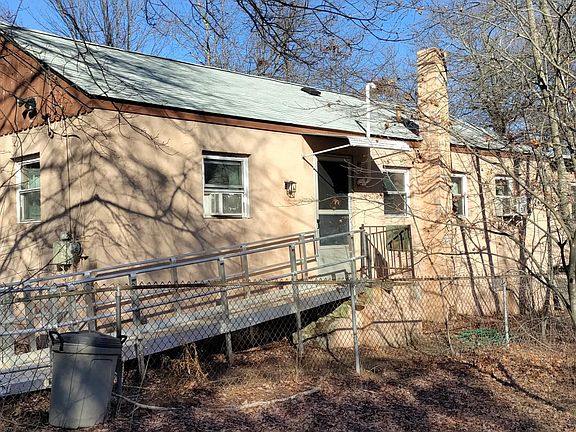 Side of house with door and handicap ramp
