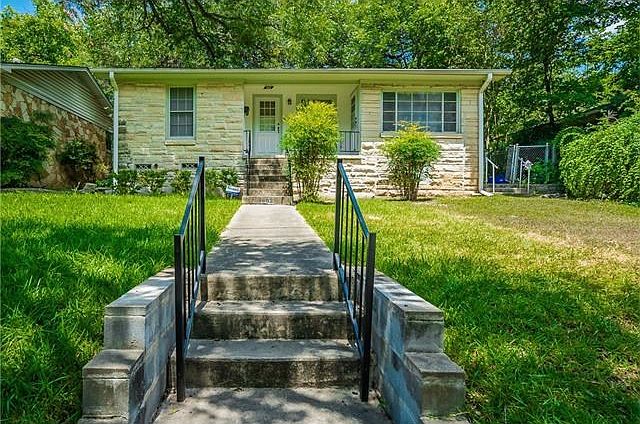 Will you renovate this 1950s home or scrape it off and build your dream home?
