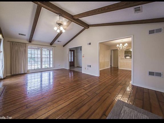 Living room showing entry to front door and entry to dining room