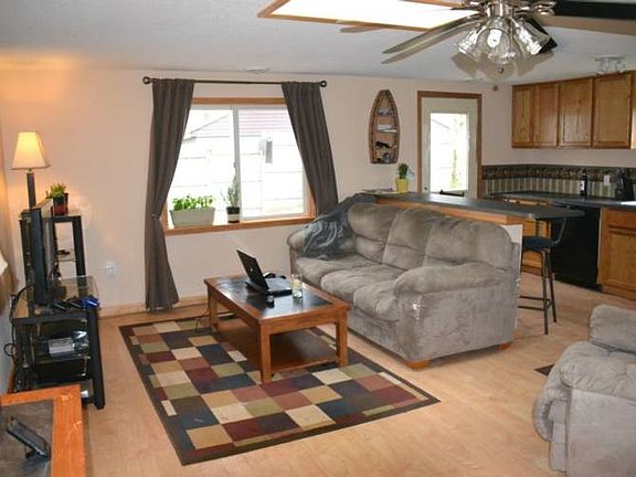 The first floor features an open floor plan.  With a cozy Living room, kitchen and dining area.