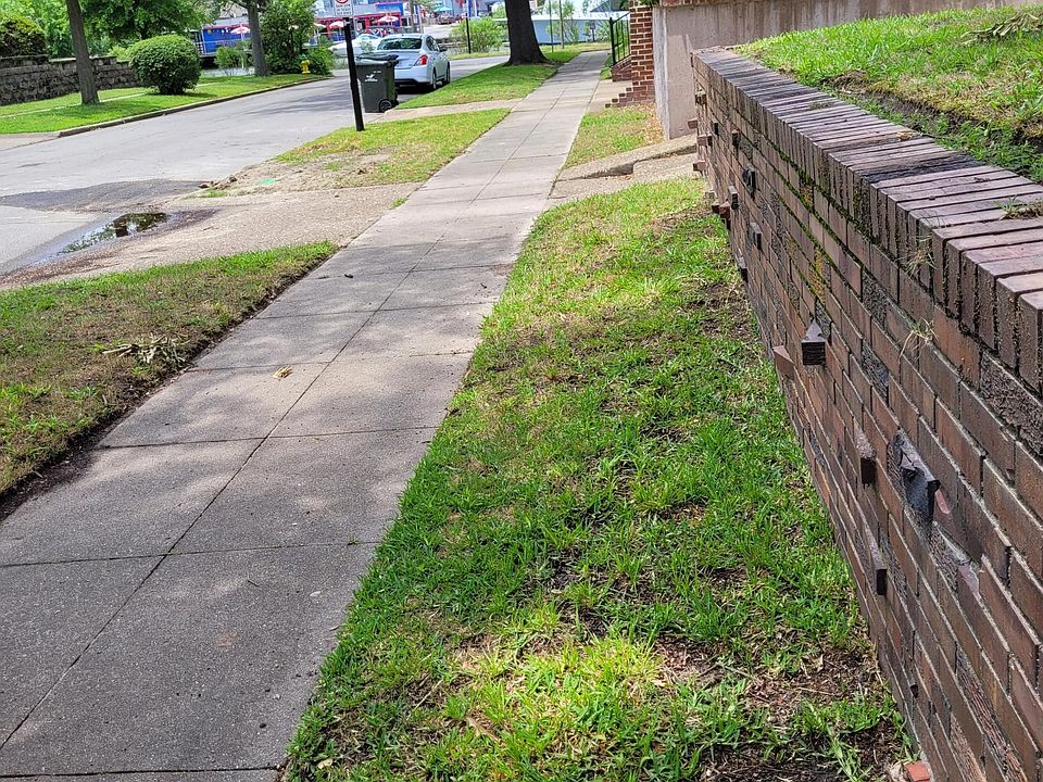 Sidewalk in front showing water close by