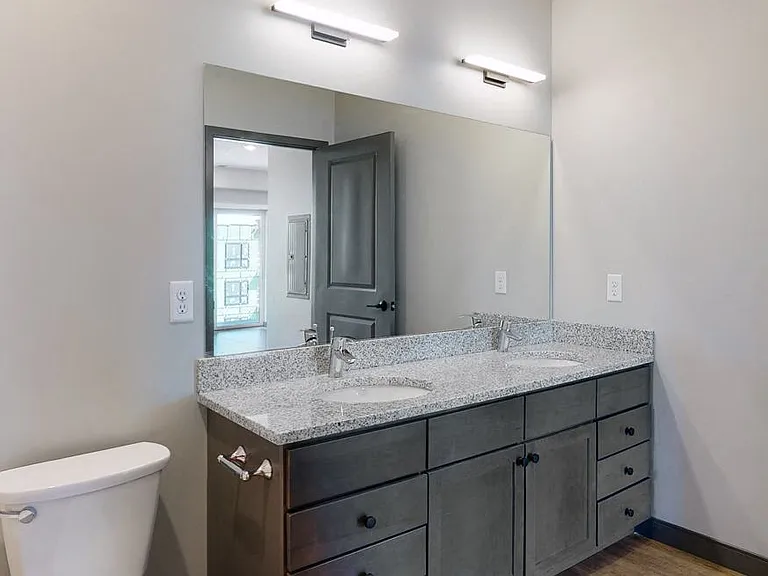 Our bathrooms include spacious vanities with ample storage.