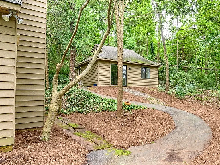 Detached studio space in secluded woods 2 miles from town and walking distance to Wegmans!