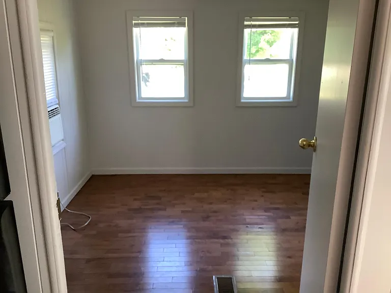 The Bedroom with the half bathroom