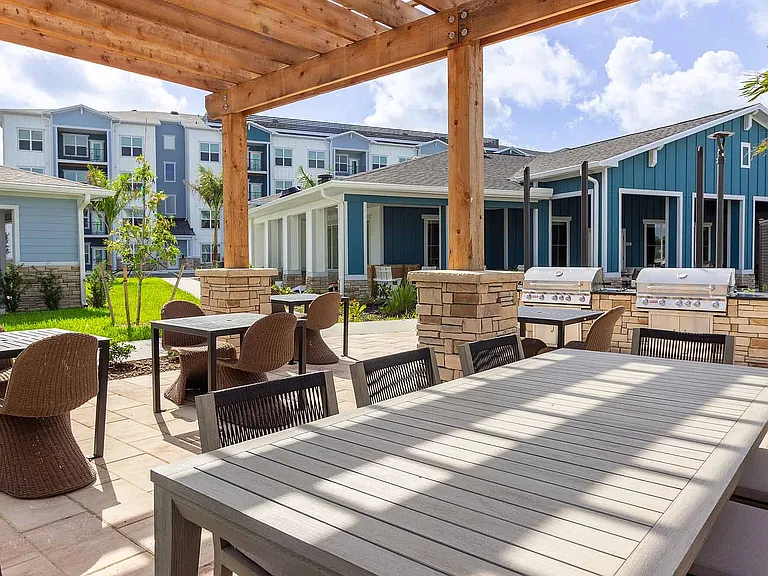 Fire up the grills at our outdoor kitchen and dining patio, complete with a shaded pergola for cookouts with friends and neighbors.