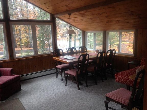 Sunroom / dining area open to kitchen.