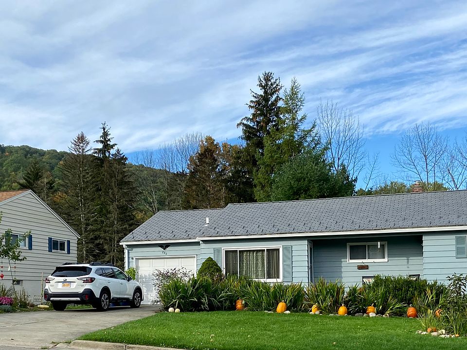 Front of house in Fall - note large driveway