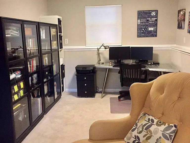 Side room off downstairs family room. Great office space or even extra bedroom area.