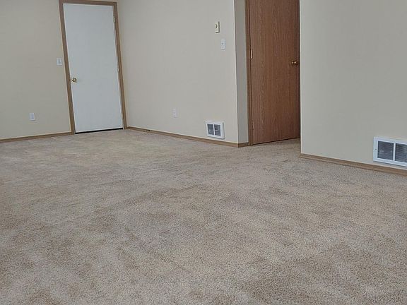 Brand new carpet in the living room, and bedrooms and hallway. Newly painted throughout the entire home including the ceilings, trim, etc. room and bedrooms.