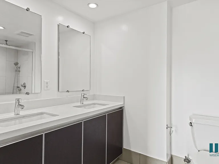 Bathroom with Double-Sink Vanity and Cabinet Storage