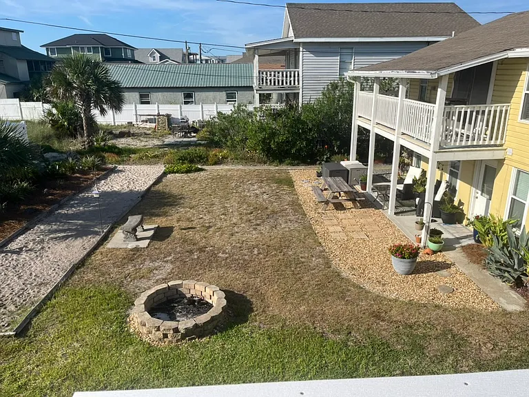 Backyard with fire pit and bocce court