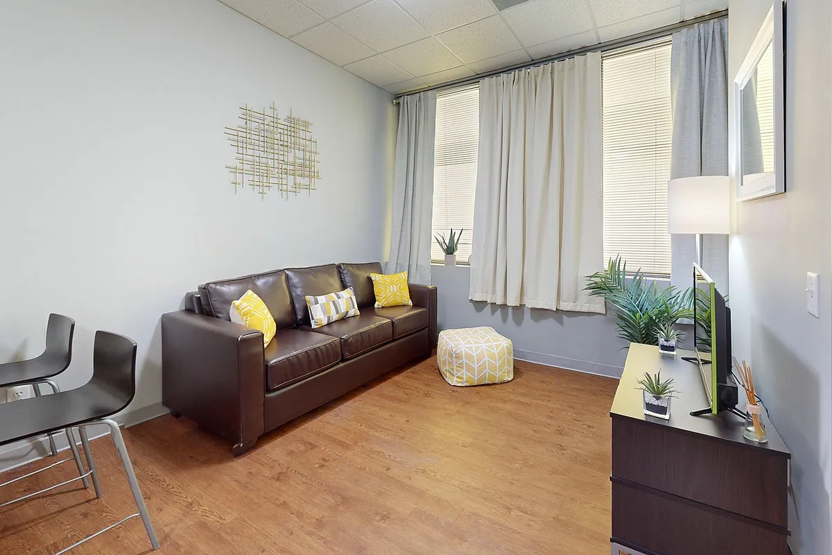 Bright Living Room with Natural Light at University Plaza NIU Off-Campus Apartments - University Plaza Apartments