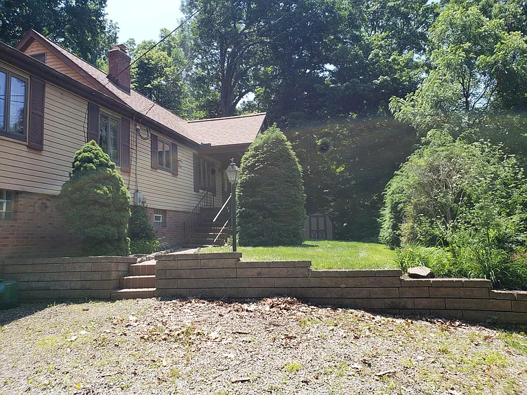 Large Parking Area, plus 2 car Garage attached