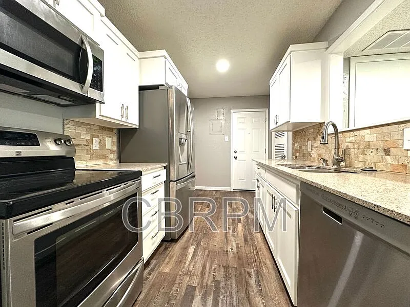 Building Photo - 6911 Gary Ave #A
