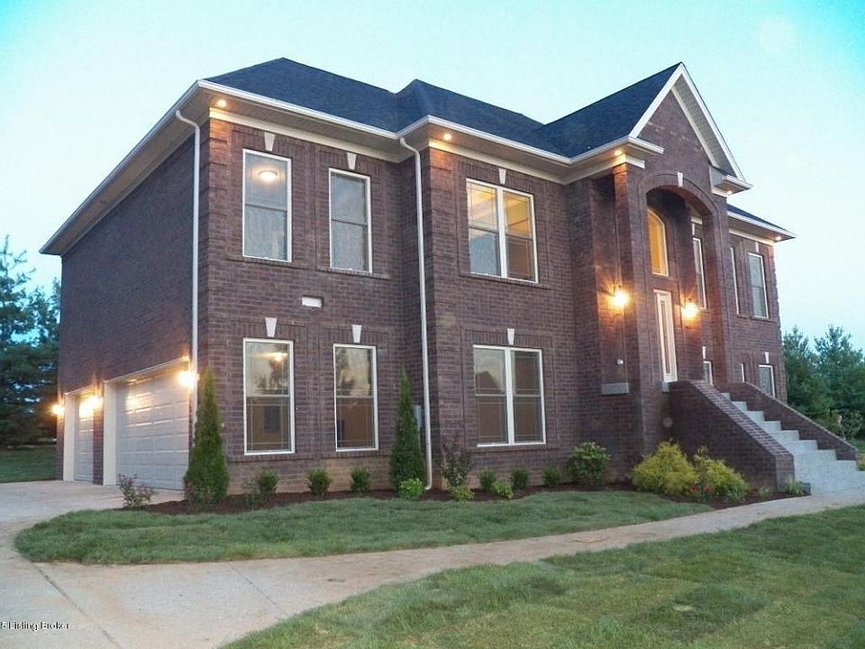 All Brick & 3 Car Garage