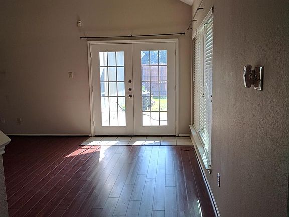 Living room with vaulted ceiling