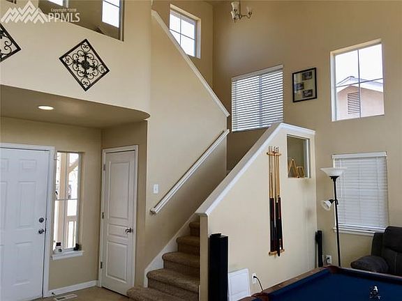 Entry, two story living room