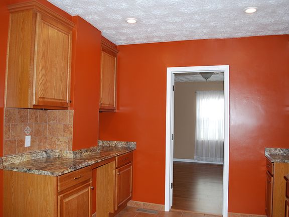 Tile backsplash throughout