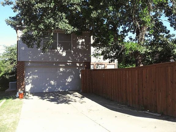 Rear entry garage with remotes