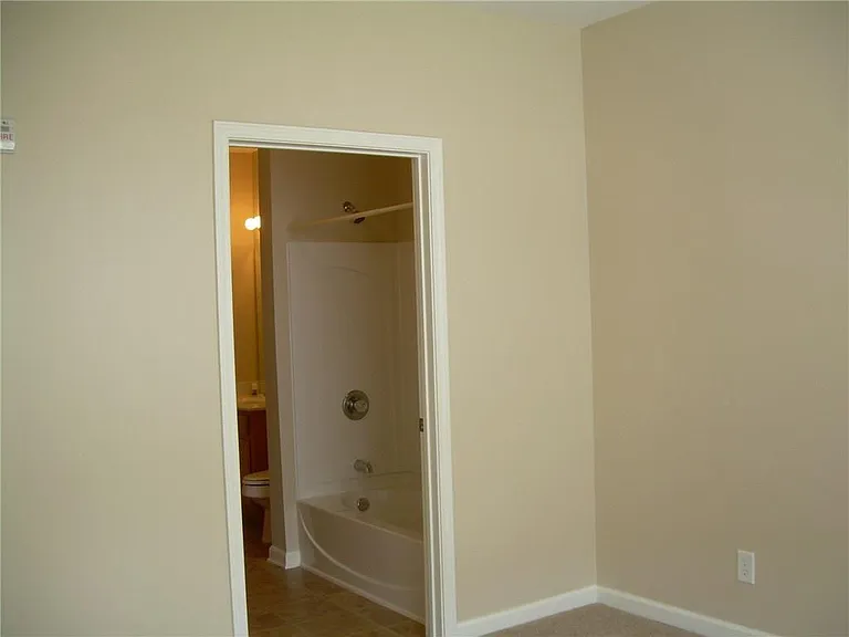 1975 Nocturne Drive
View from second bedroom to second bathroom.