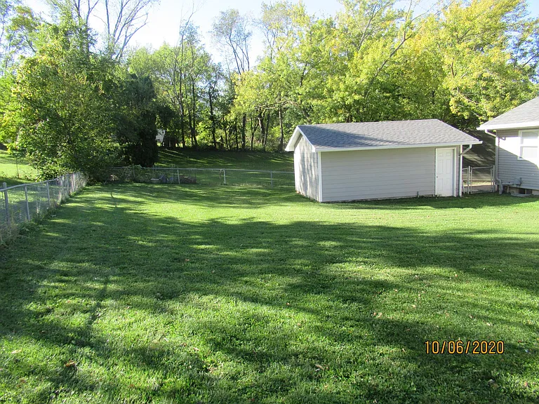 Fenced-in Backyard and Garage on other side of Duplex