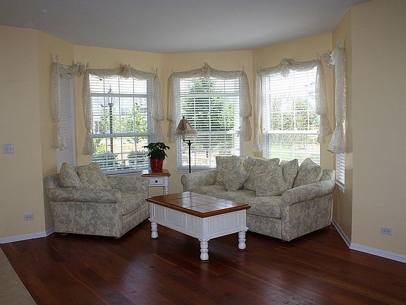 Huge living room with Custom American Cherry wood floors 