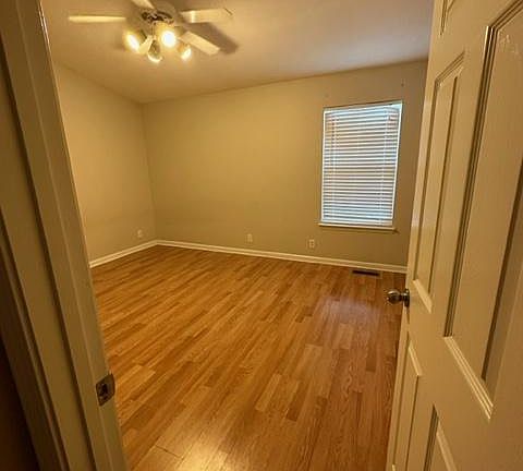 Master bedroom, it looks yellow in this picture, but is is actually beige.