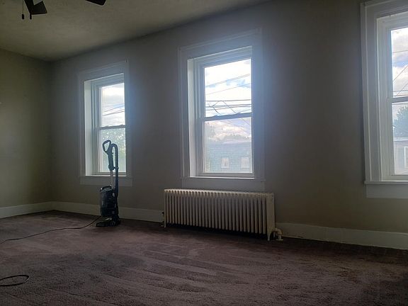 Huge living room facing E. Dominick St.